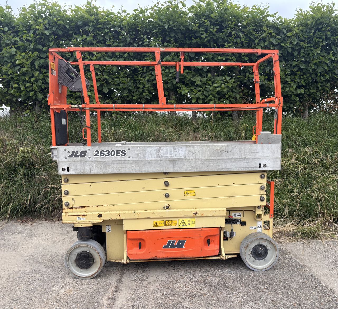JLG 2630ES - 9,8m werkhoogte - NIEUWE accu’s + lader - GEKEURD