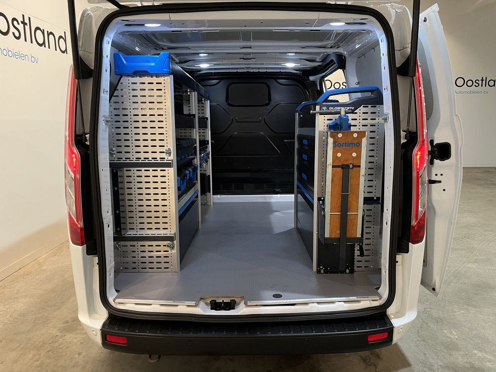 Ford Transit Custom 280 2.0 TDCI L1H1 Trend 130 PK / Servicebus / Sortimo Inrichting / Euro 6 / Airco / Camera / CarPlay / Cruise Control Adap. / Navigatie / Klep / 3-Zits / 55.000 KM !!