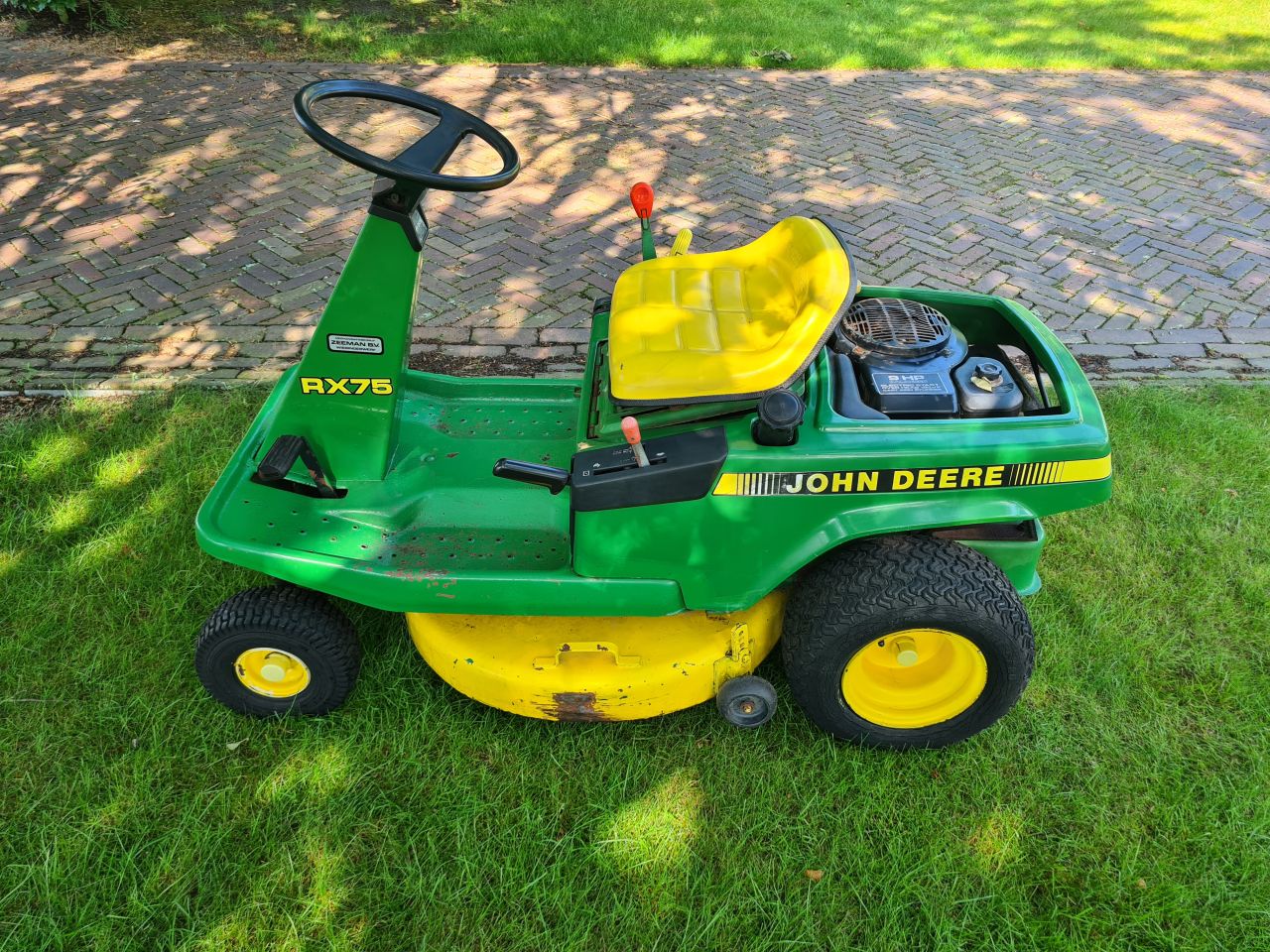 John Deere RX 75 zitmaaier.