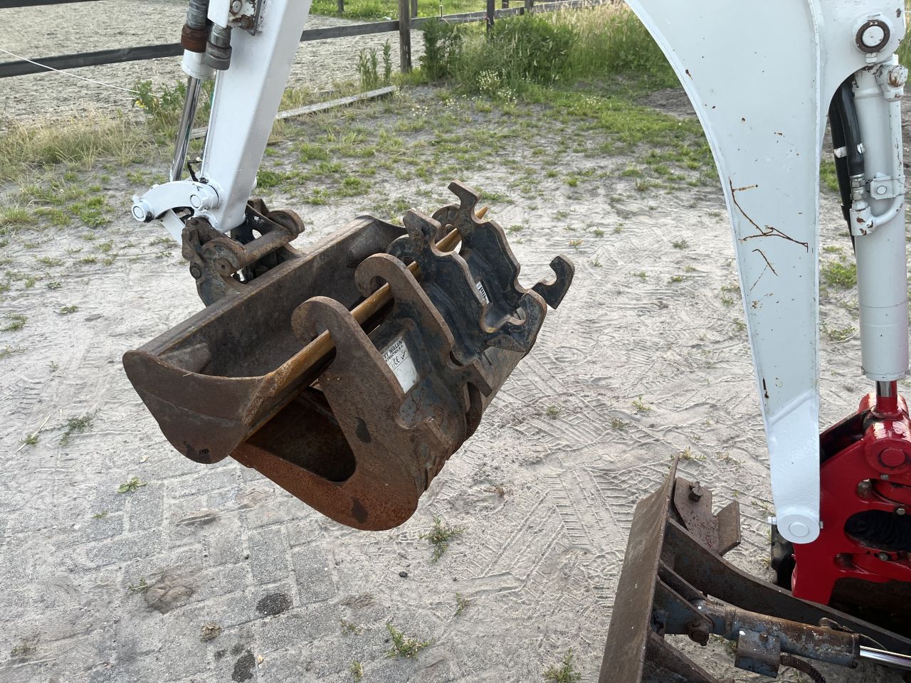 Takeuchi tb210R te huur