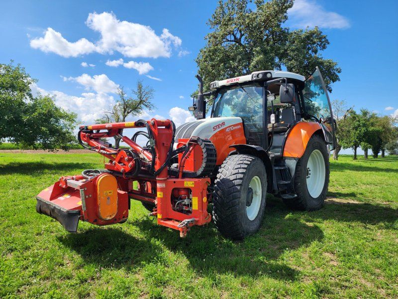 Steyr 4110 Profi Dücker UNA 500 Mulcher Astschere