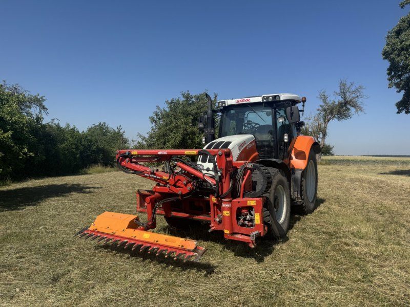 Steyr 4110 Profi Dücker UNA 500 Mulcher Astschere