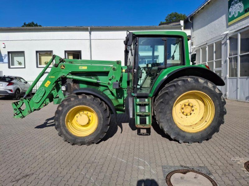 John Deere 6620 m. Frontlader