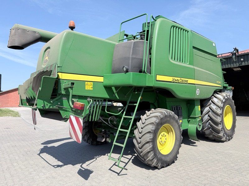 John Deere W540 mit Raspvorsatz