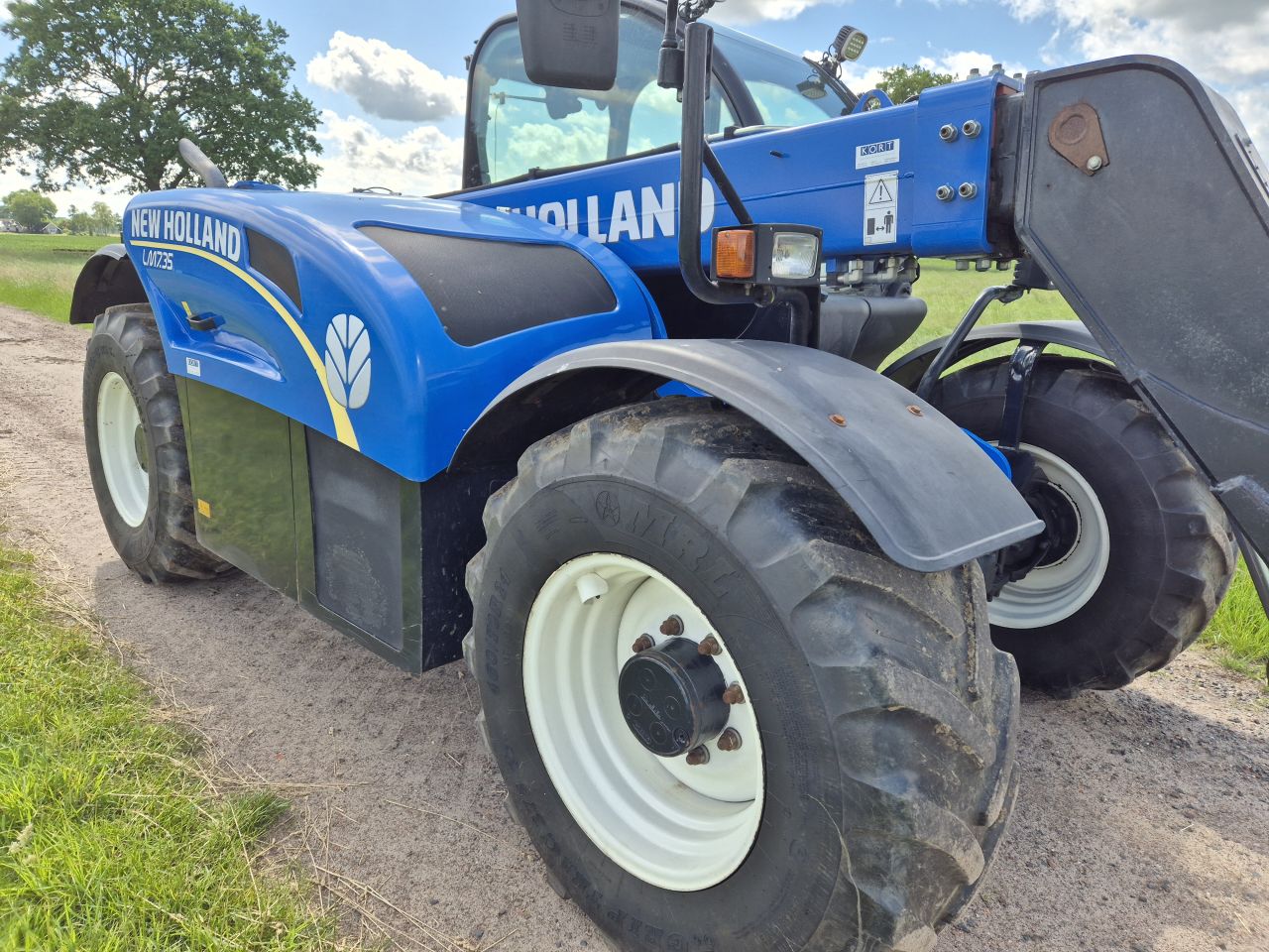 Claas 746 Scopion Varipower en New Holland LM 7.35