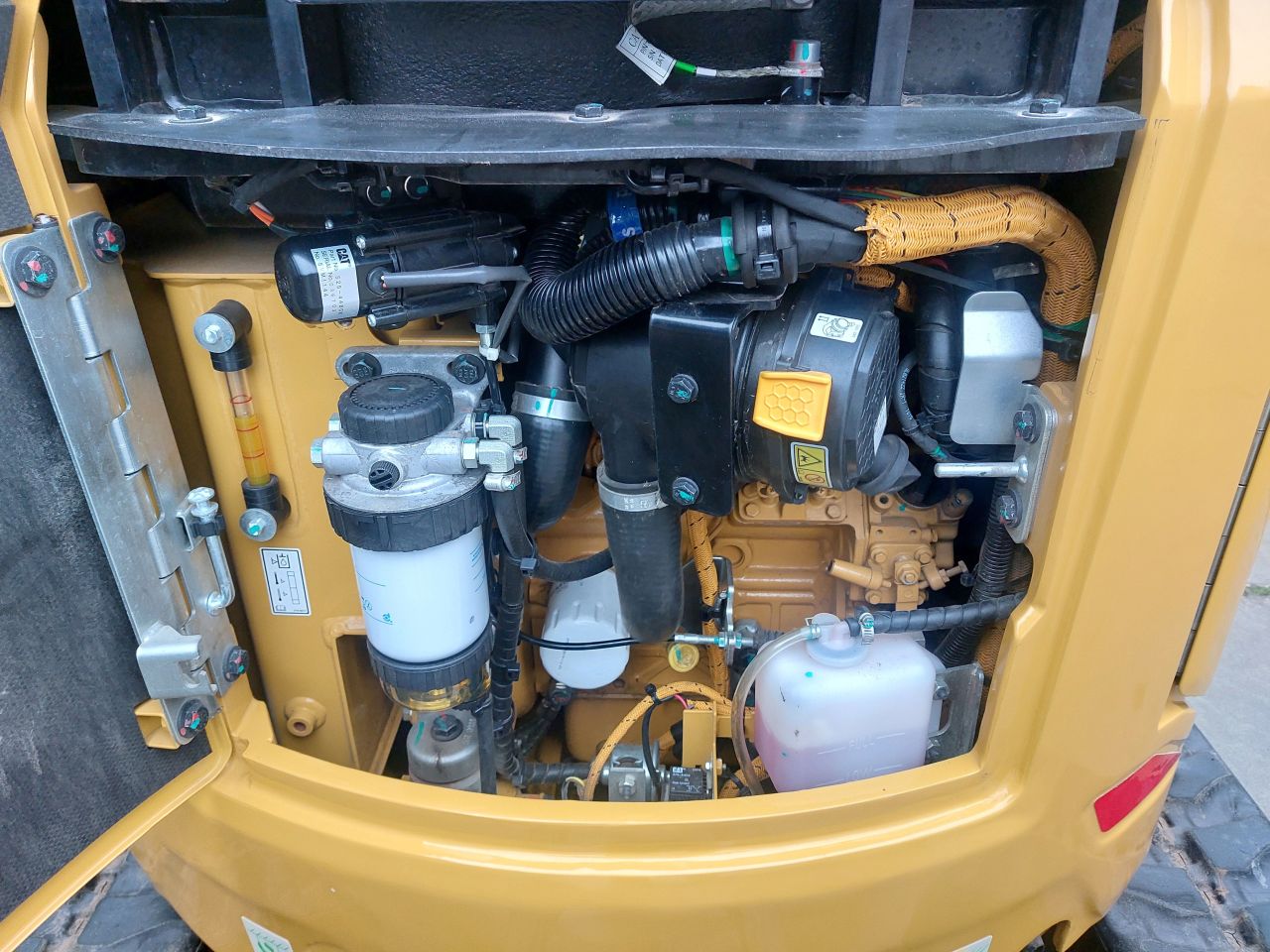 Caterpillar 302CR met Engcon draai/kantelstuk