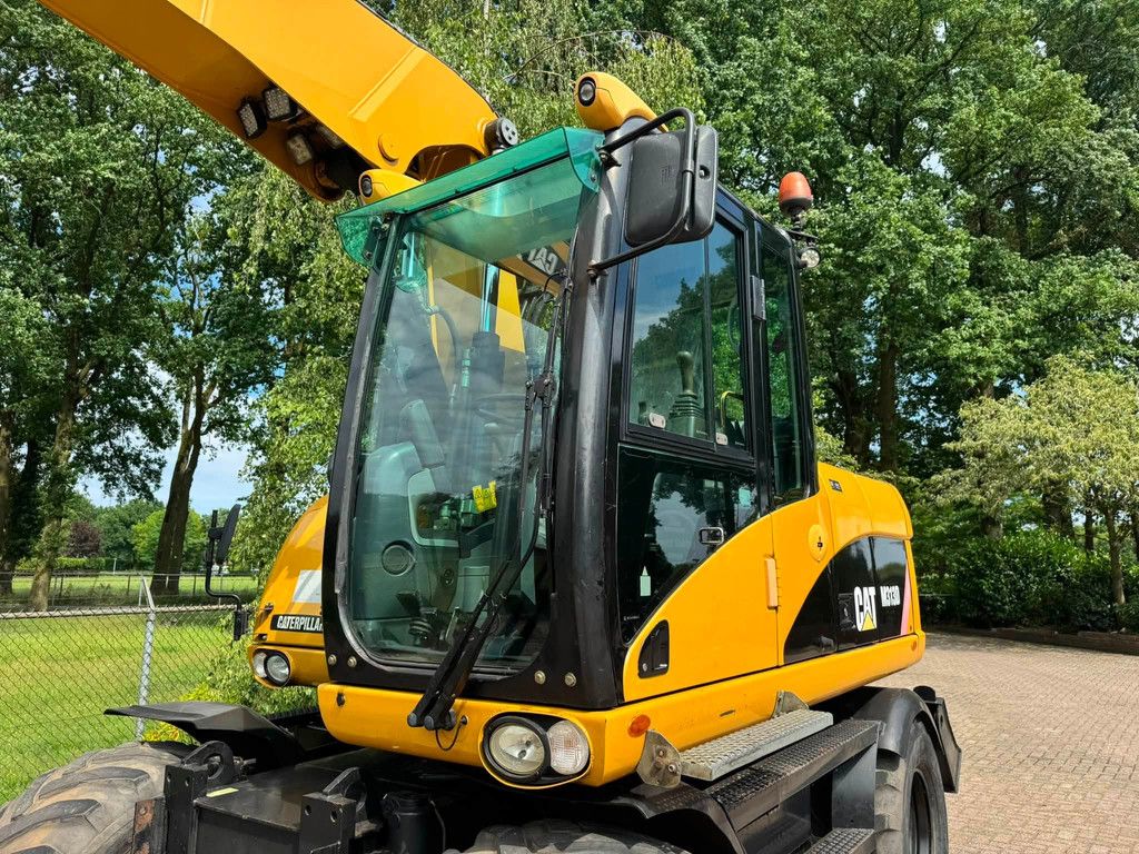 Caterpillar M313D Mobiele kraan CW30