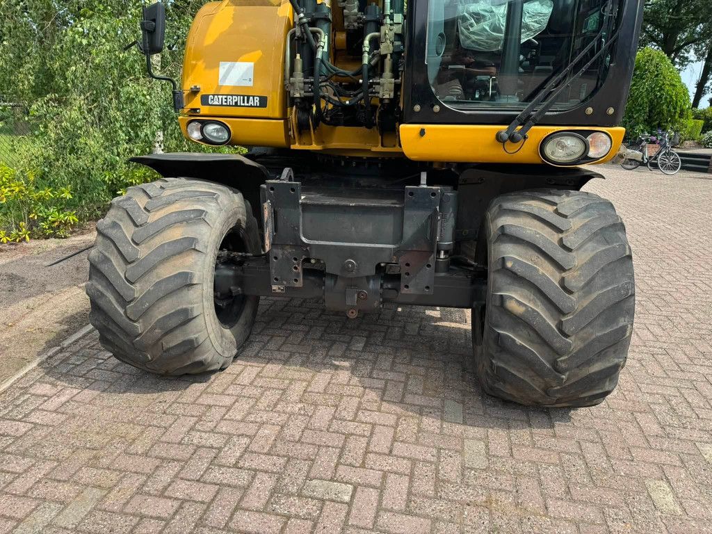 Caterpillar M313D Mobiele kraan CW30