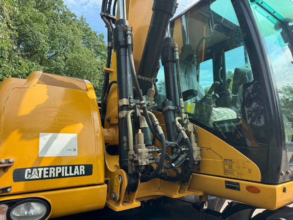 Caterpillar M313D Mobiele kraan CW30
