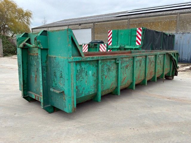 Waste container with hydraulic tailgate