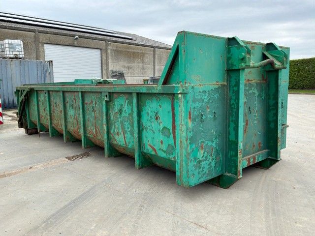 Waste container with hydraulic tailgate