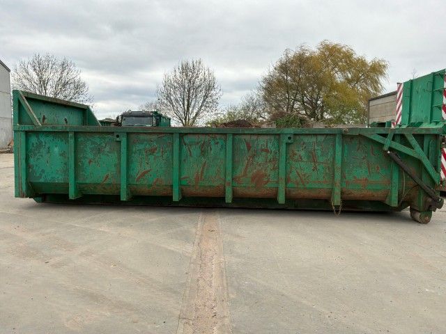 Waste container with hydraulic tailgate