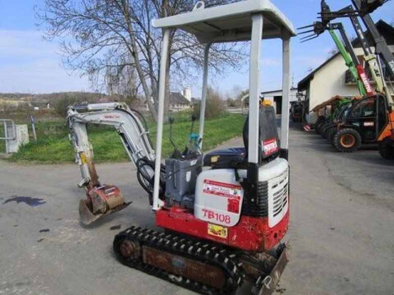 Takeuchi TB 108 mechan. Schnellwechsler MARTIN + 2 Löff