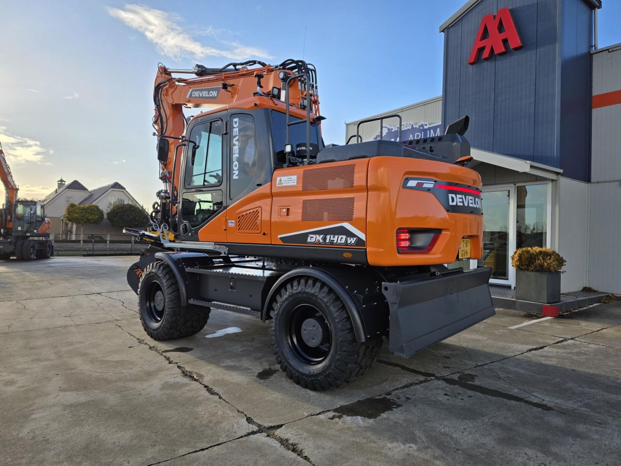 Develon DX140W-7