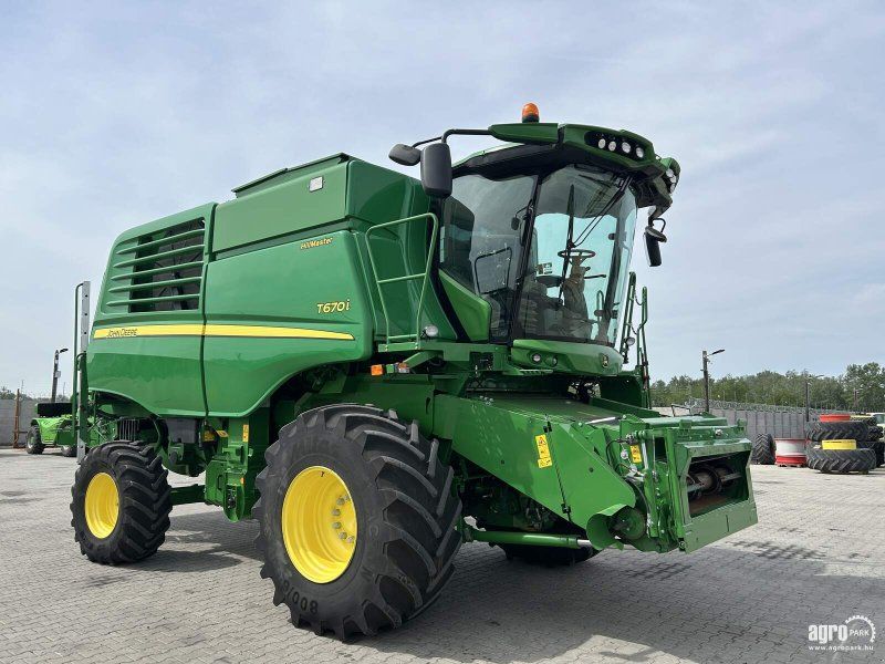 John Deere T670i Hillmaster 6 straw walker, 9.15 m 630X Vario header, heade