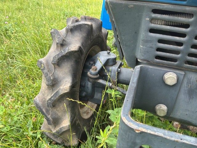 Iseki Landhope TU145F four-wheel-drive mini tractor with rotary tiller