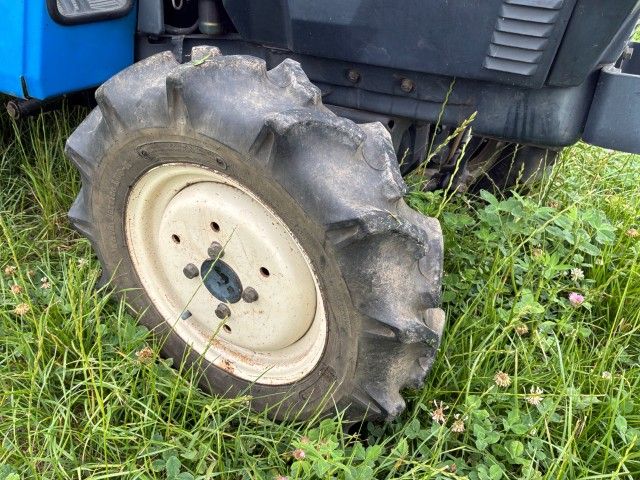 Iseki Landhope TU145F four-wheel-drive mini tractor with rotary tiller
