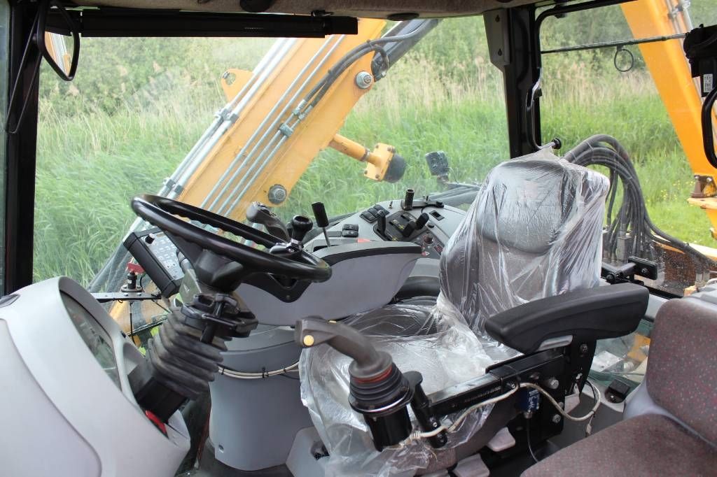 Massey Ferguson 6480 met Herder Grenadier 518LS