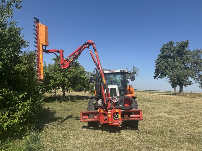 Steyr 4110 Profi Dücker UNA 500 Astschere