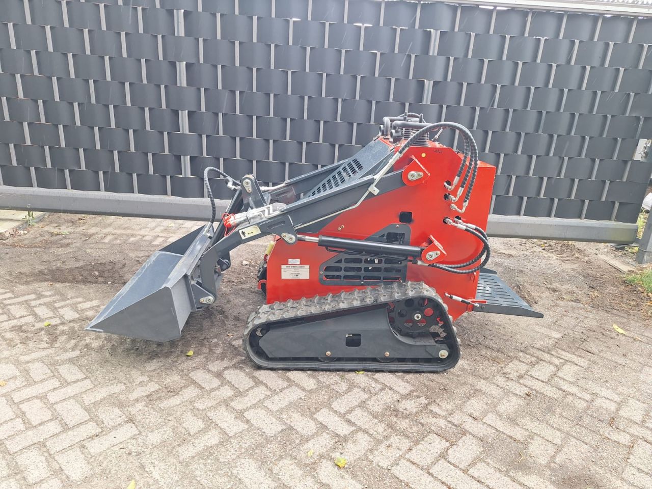 Skidster schranklader minishovel kubota bobcat