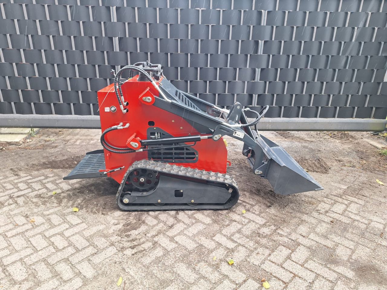 Skidster schranklader minishovel kubota bobcat