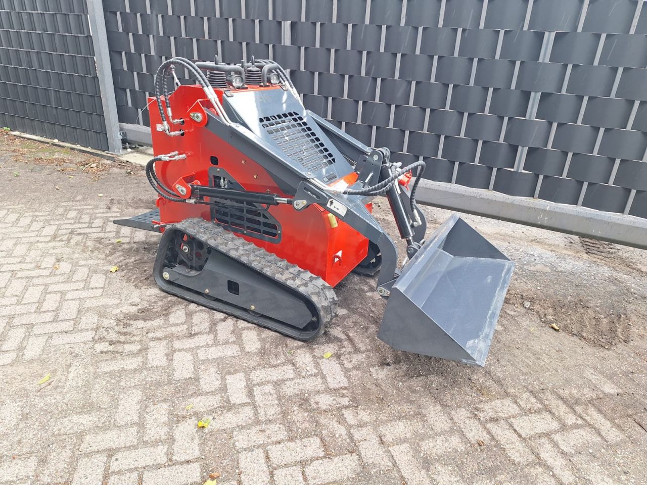Skidster schranklader minishovel kubota bobcat