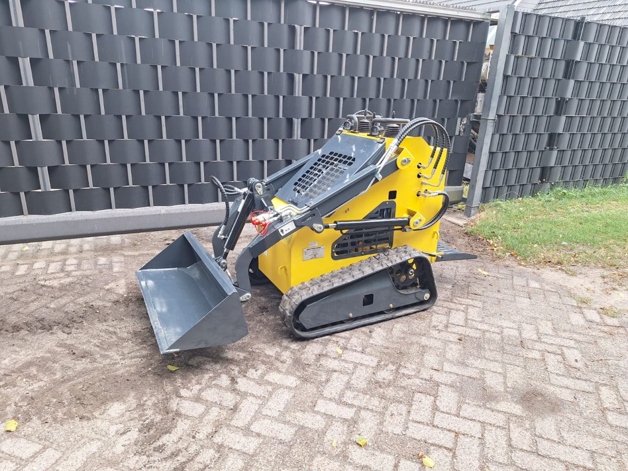 Skidster schranklader minishovel kubota bobcat