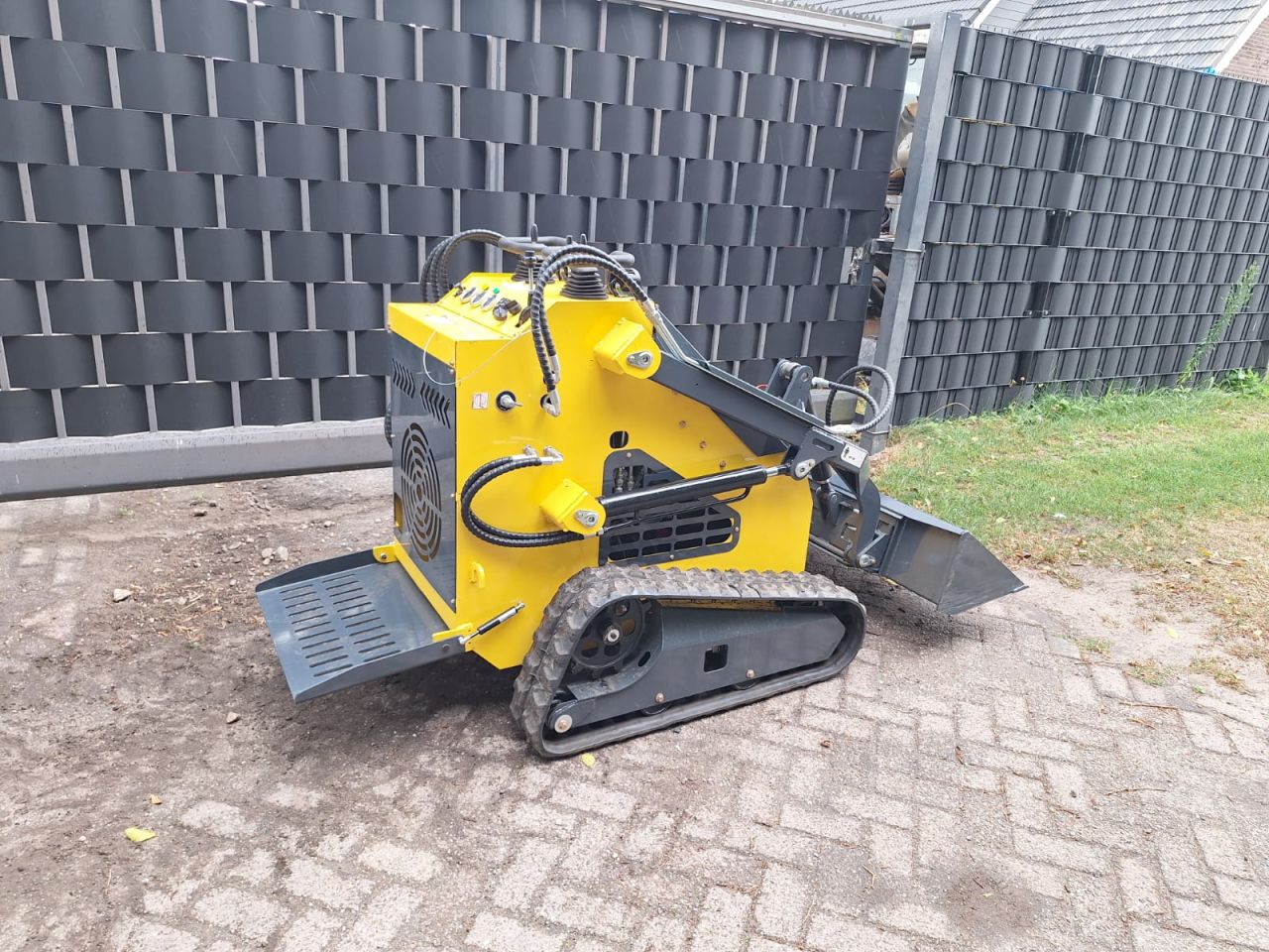 Skidster schranklader minishovel kubota bobcat