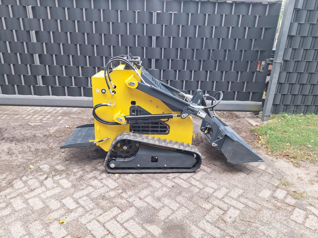 Skidster schranklader minishovel kubota bobcat