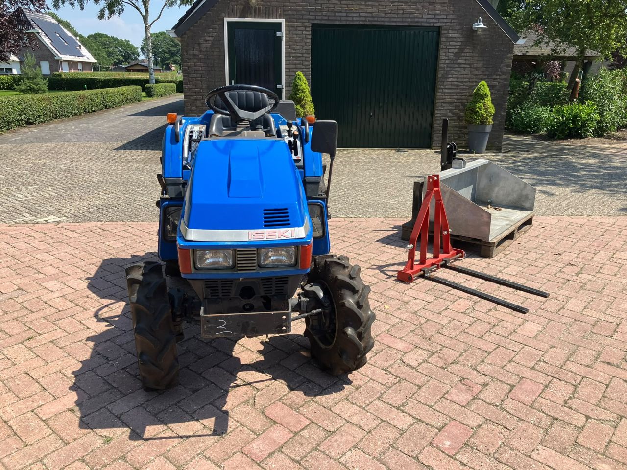 Nette Iseki 165 met werktuigen (marge)