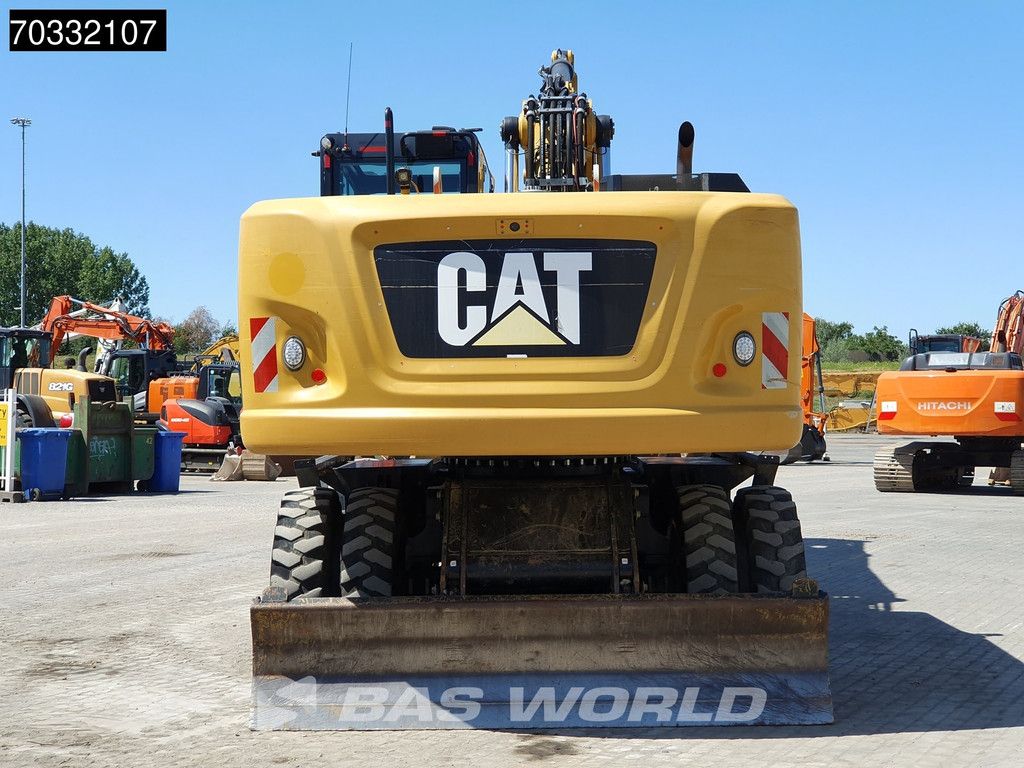 Caterpillar M322 F OUTRIGGERS + BLADE