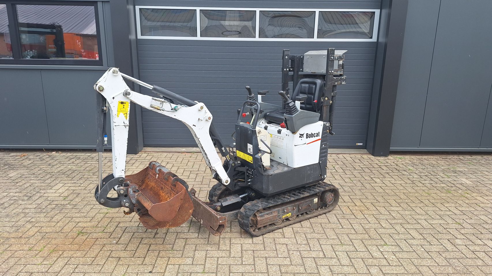 Bobcat E10 sloop/sorteer functie 1800uur/2014