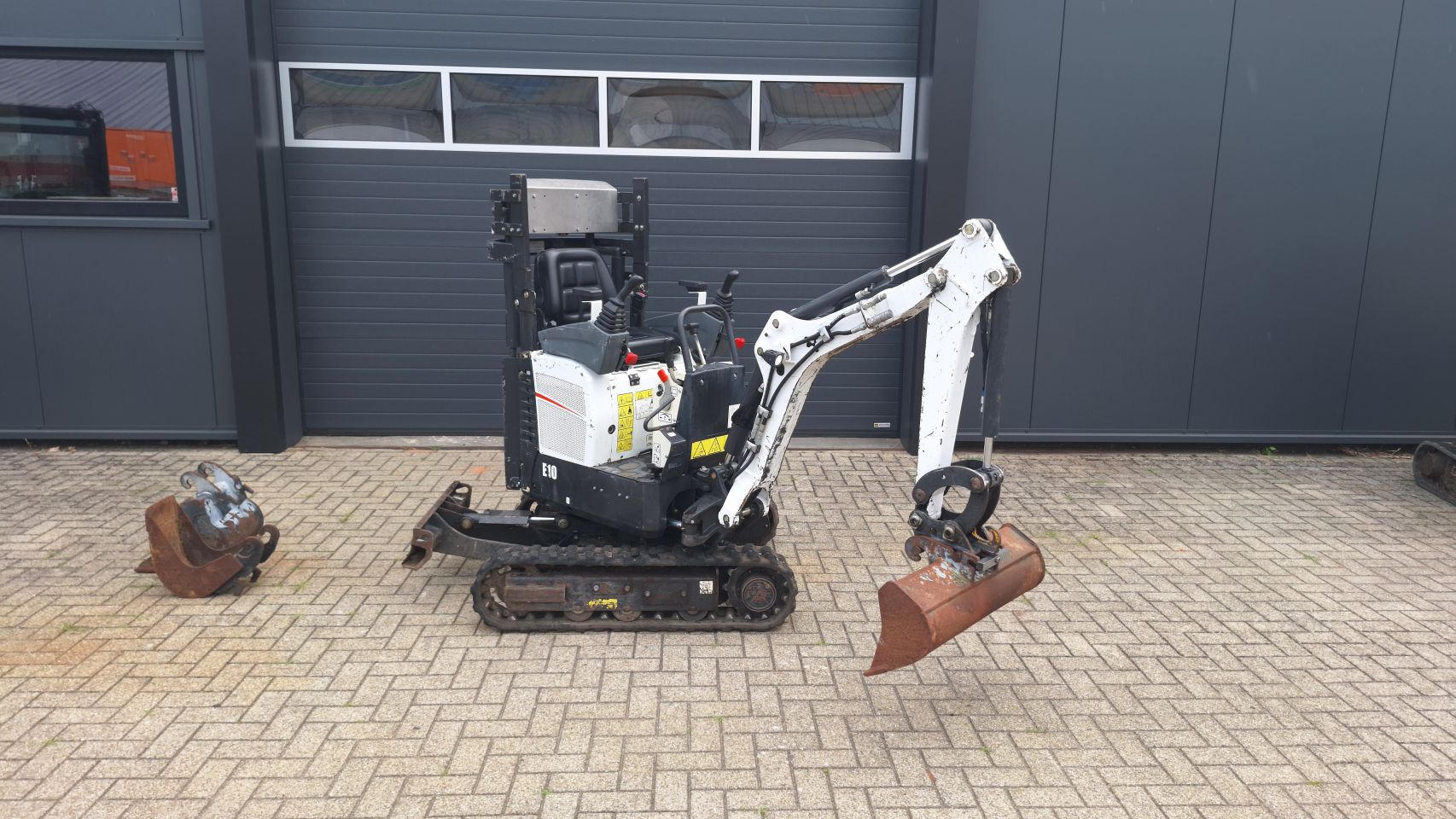 Bobcat E10 sloop/sorteer functie 1800uur/2014