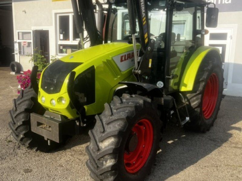 Claas Axos 320 CX