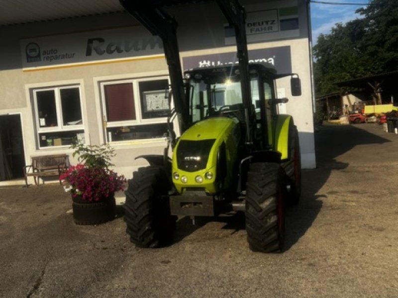 Claas Axos 320 CX