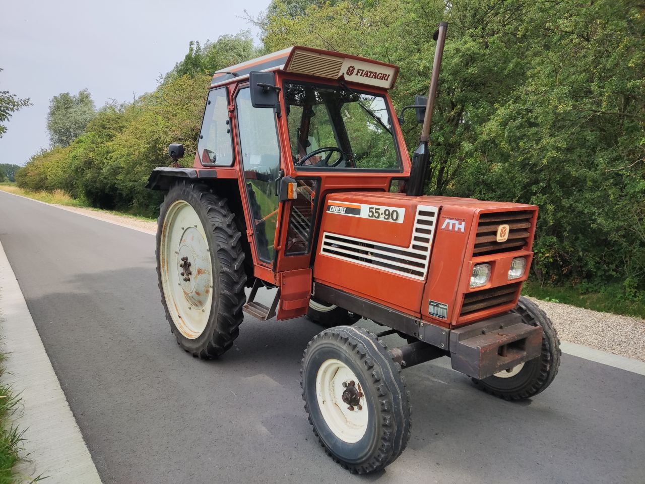FIAT tractor (type 55-90 (4.520 uur)) compleet met machines