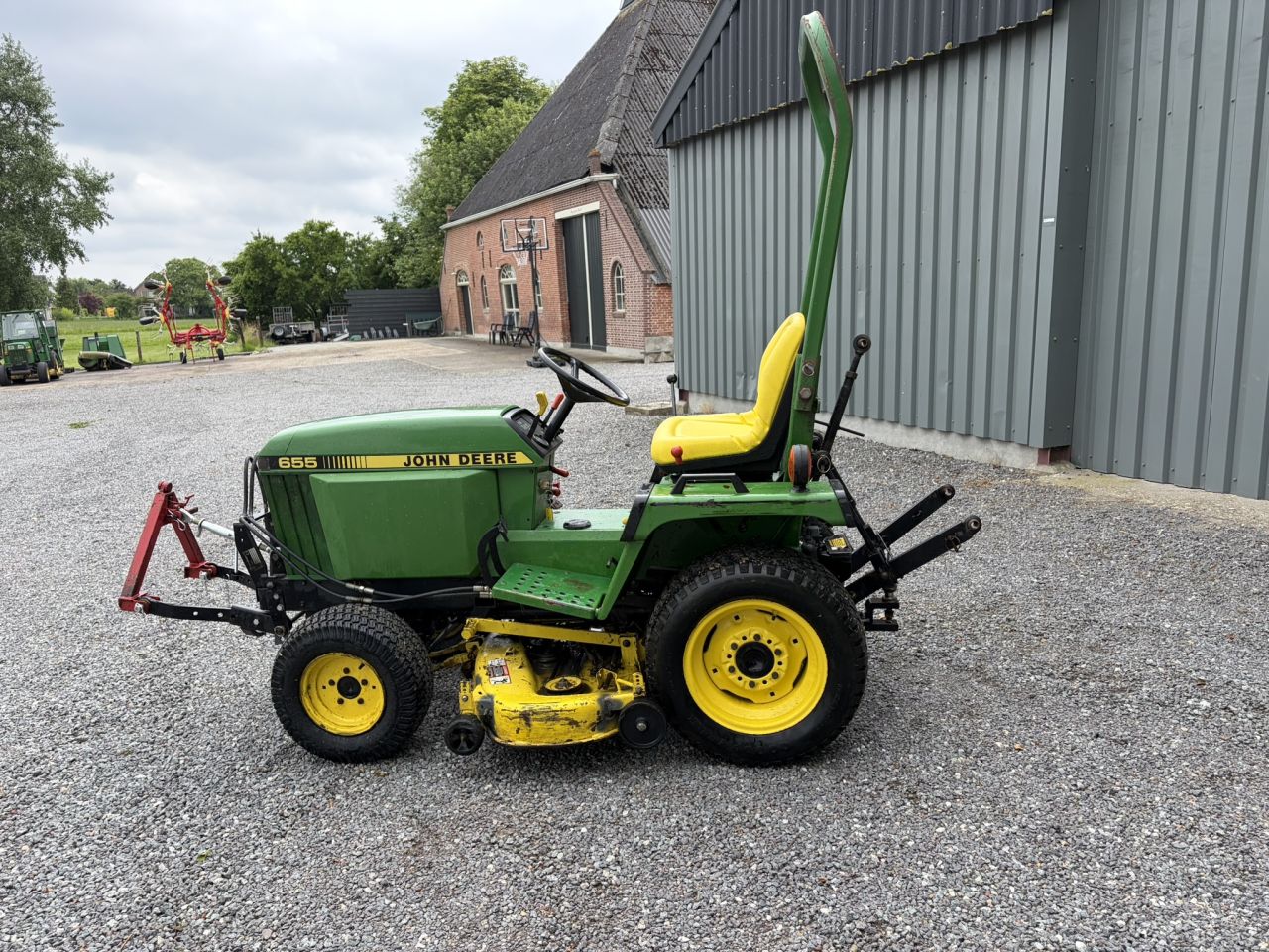 John Deere 655 Diesel 4wd compact tractor met maaidek, fronthef