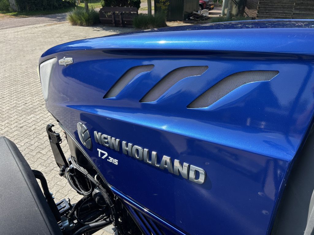New Holland T7.315 HD AutoCommand. Fronthef, Vooras vering, RTK Gps, Bluepower uitv, 40km eco