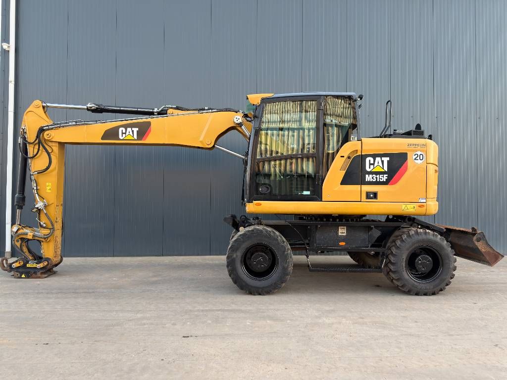 CAT M315F - With OilQuick