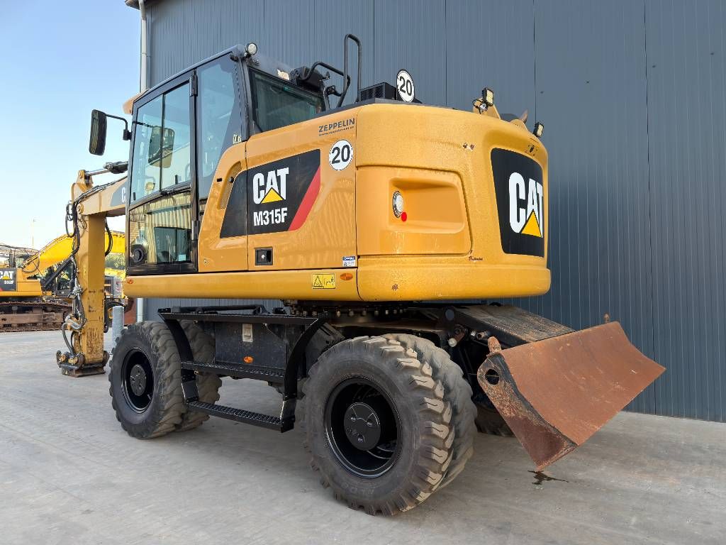 CAT M315F - With OilQuick