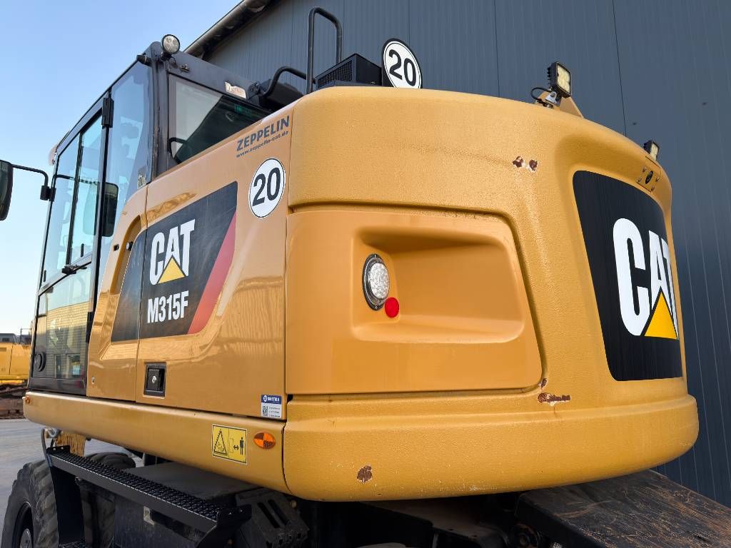 CAT M315F - With OilQuick