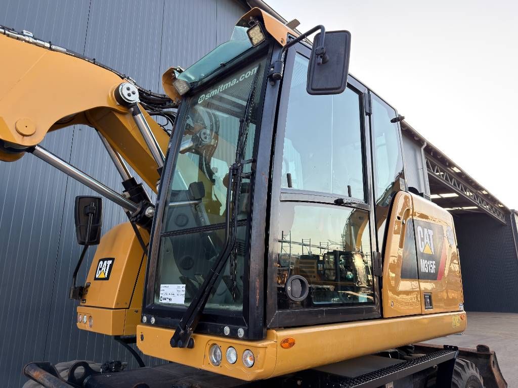CAT M315F - With OilQuick