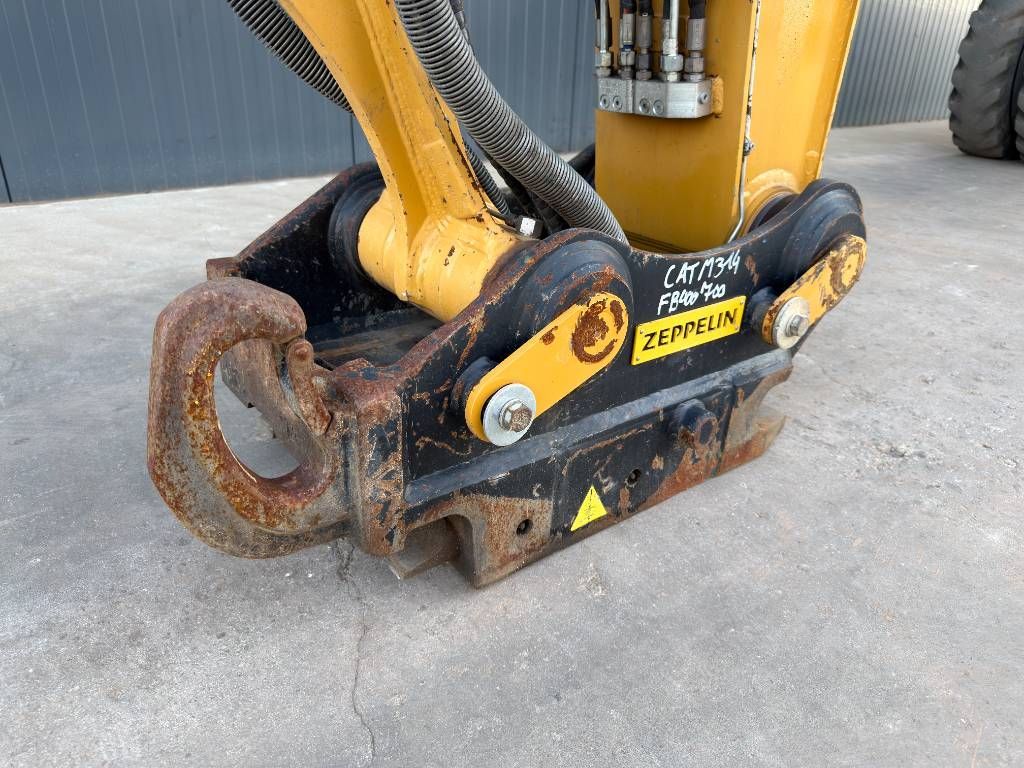 CAT M315F - With OilQuick