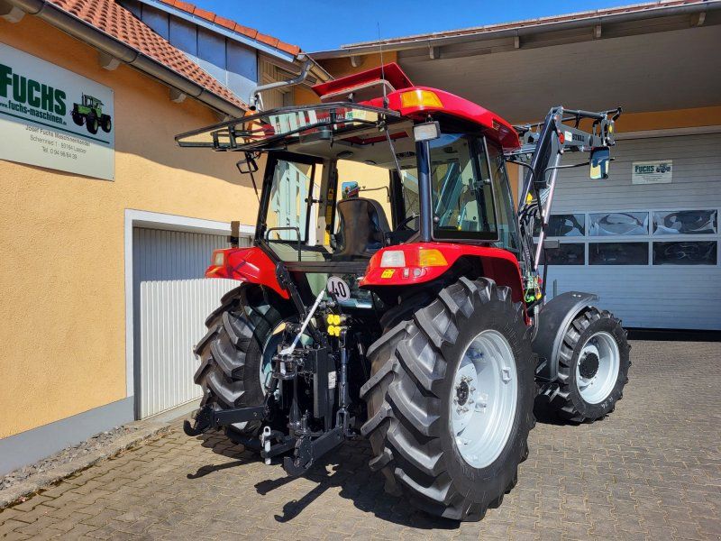 Case JX 70U mit Industriefrontlader