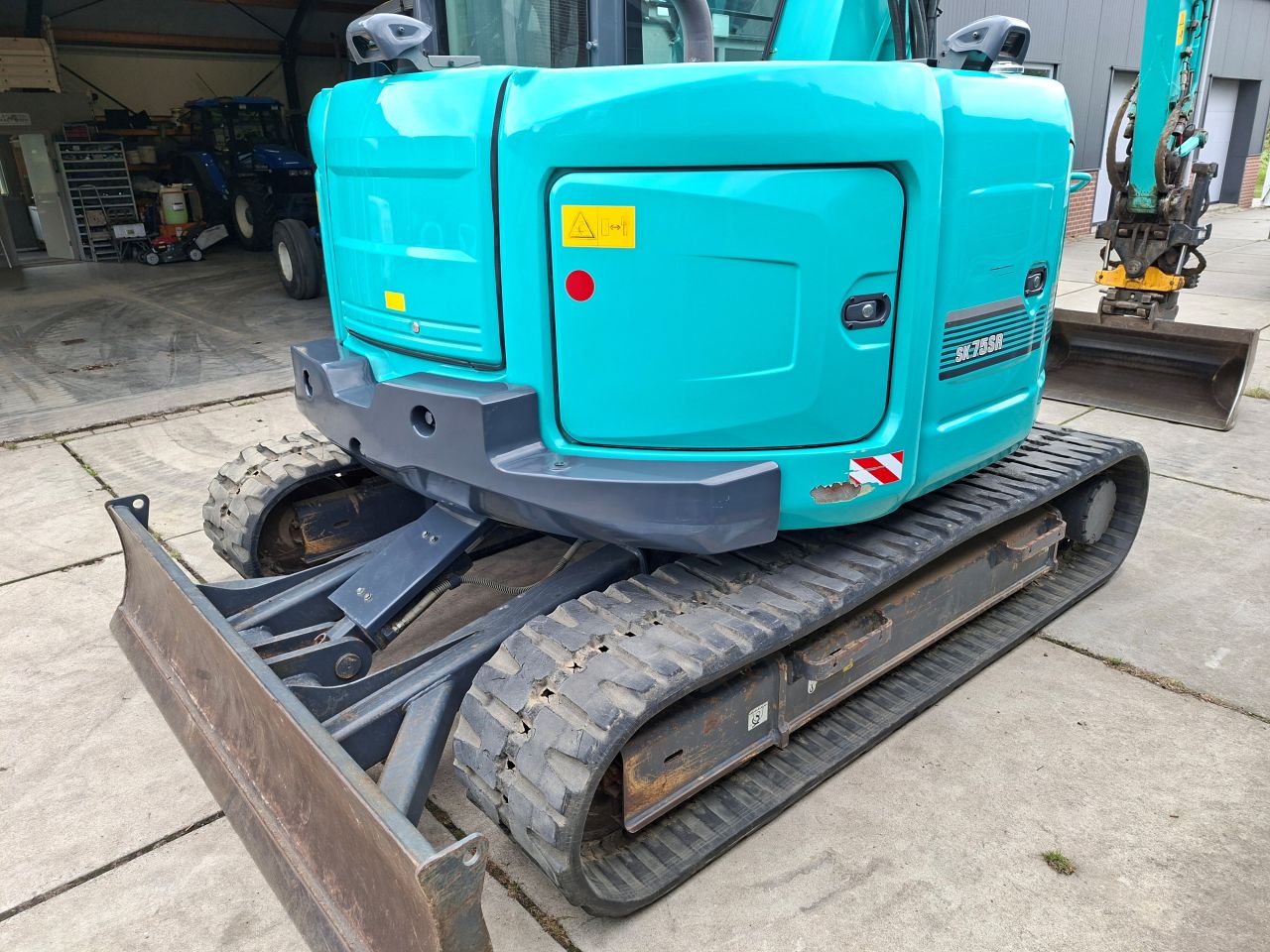 Kobelco SK75SR-3E 8 tons Engcon Oilquick draaikantelstuk