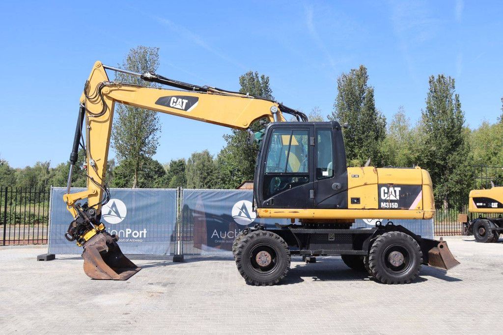 Wheel excavator Caterpillar M315D Diesel 2011