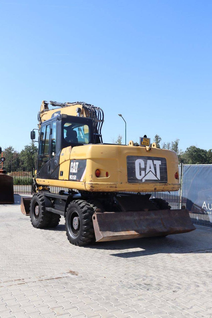 Wheel excavator Caterpillar M315D Diesel 2011