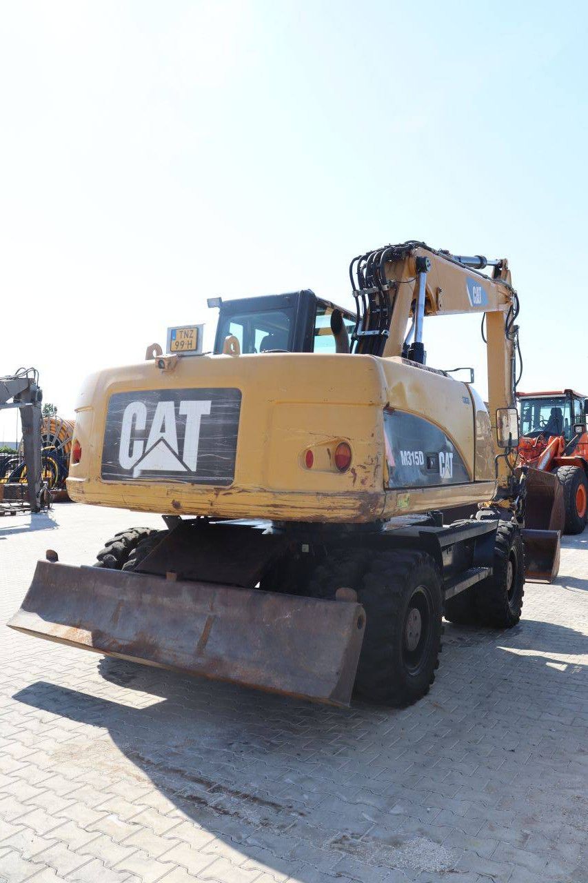 Wheel excavator Caterpillar M315D Diesel 2011
