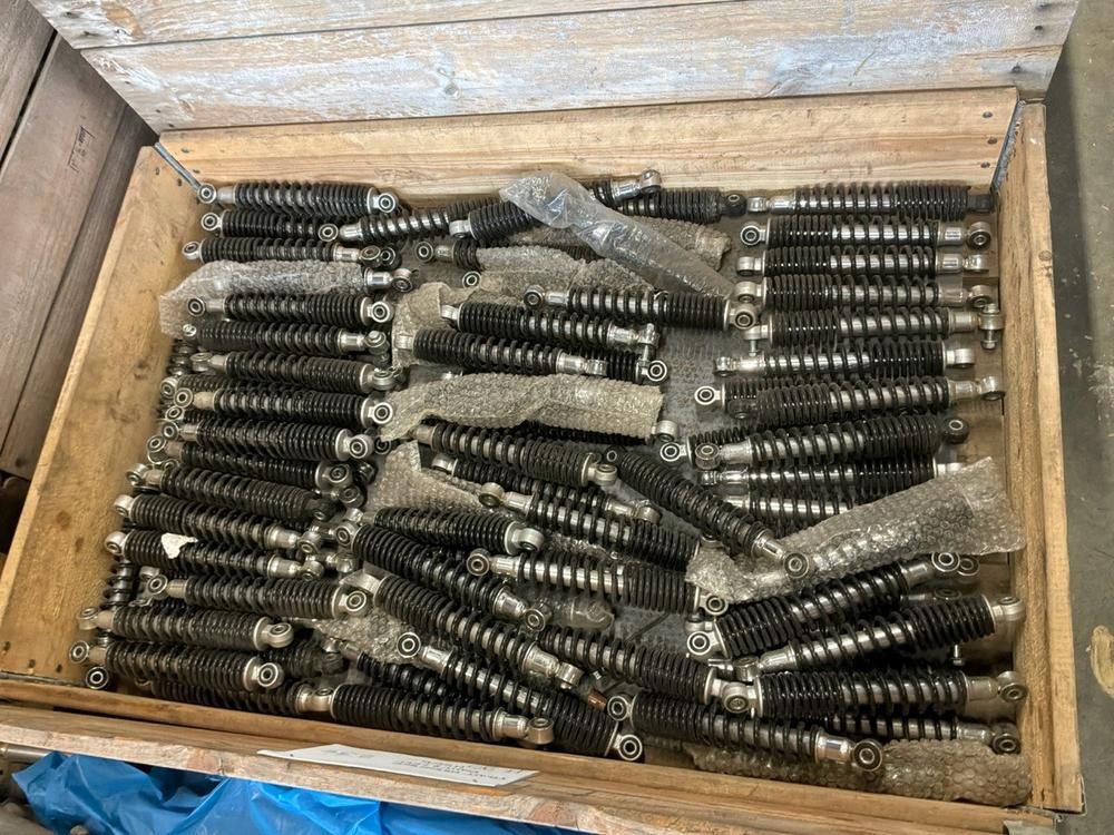 Super Soco Cux shock absorbers, front fork legs, chargers, wiring harnesses, brake systems (18x)