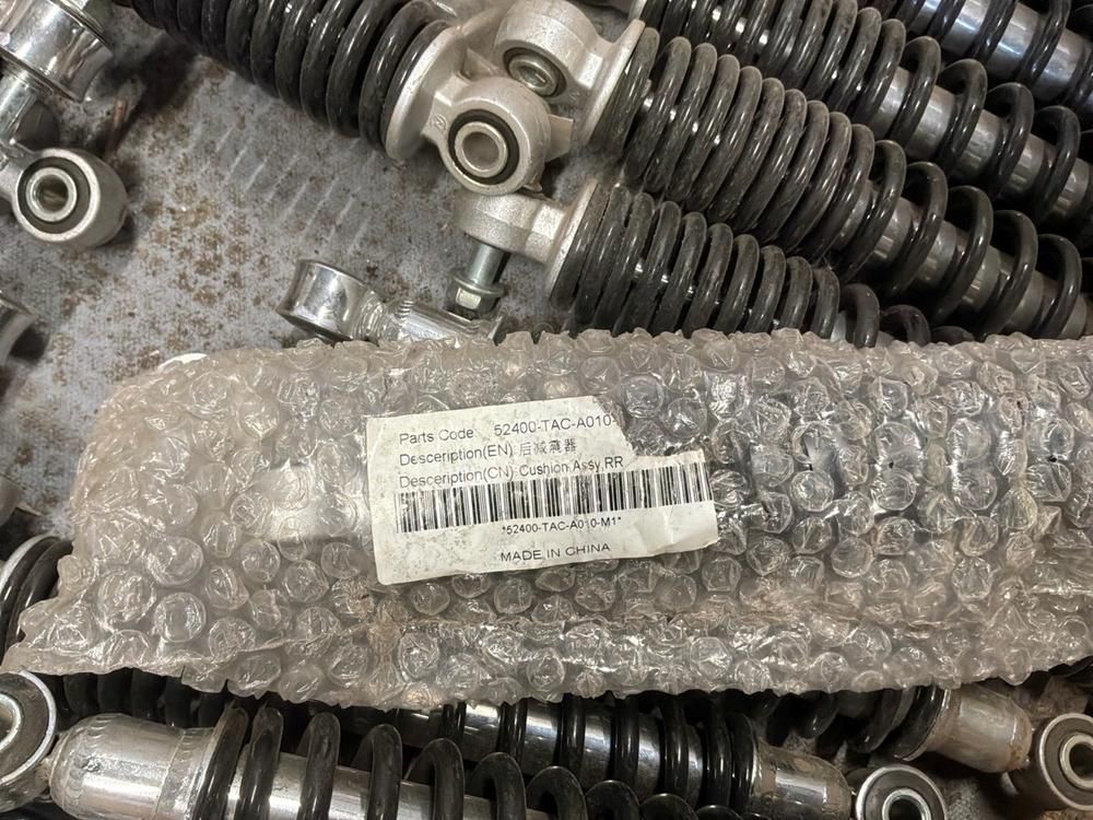 Super Soco Cux shock absorbers, front fork legs, chargers, wiring harnesses, brake systems (18x)